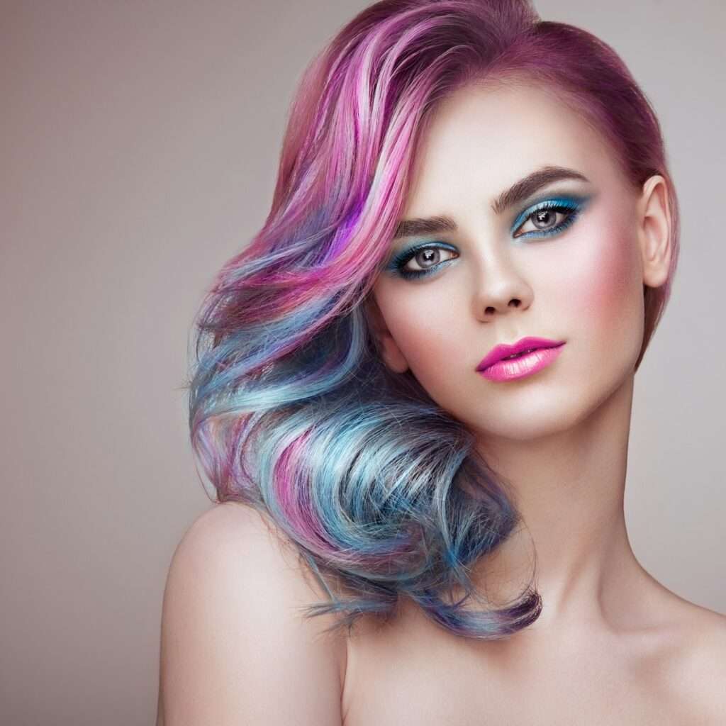 Beauty fashion model girl with colorful dyed hair