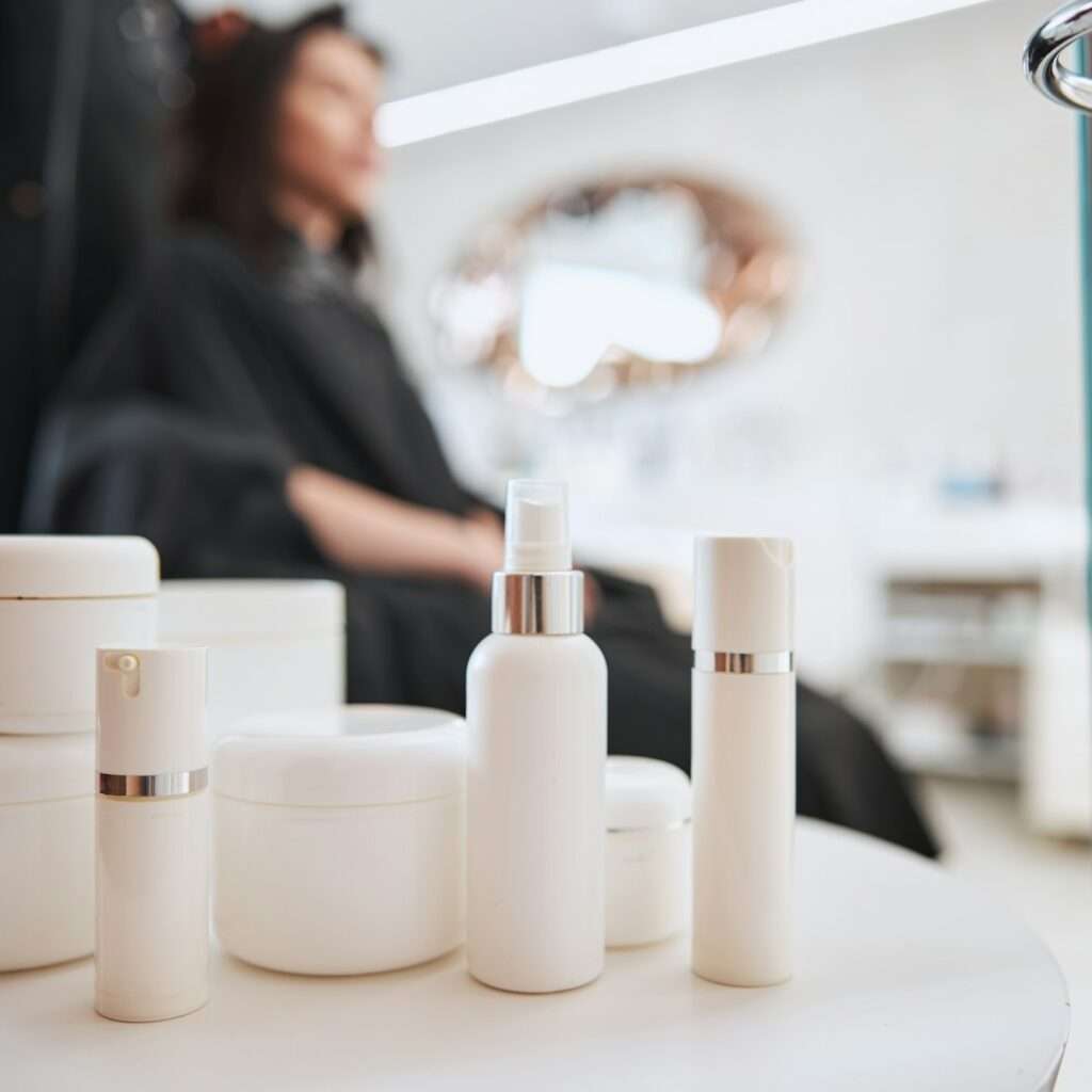 Customer having her hair styled by professional haircare products