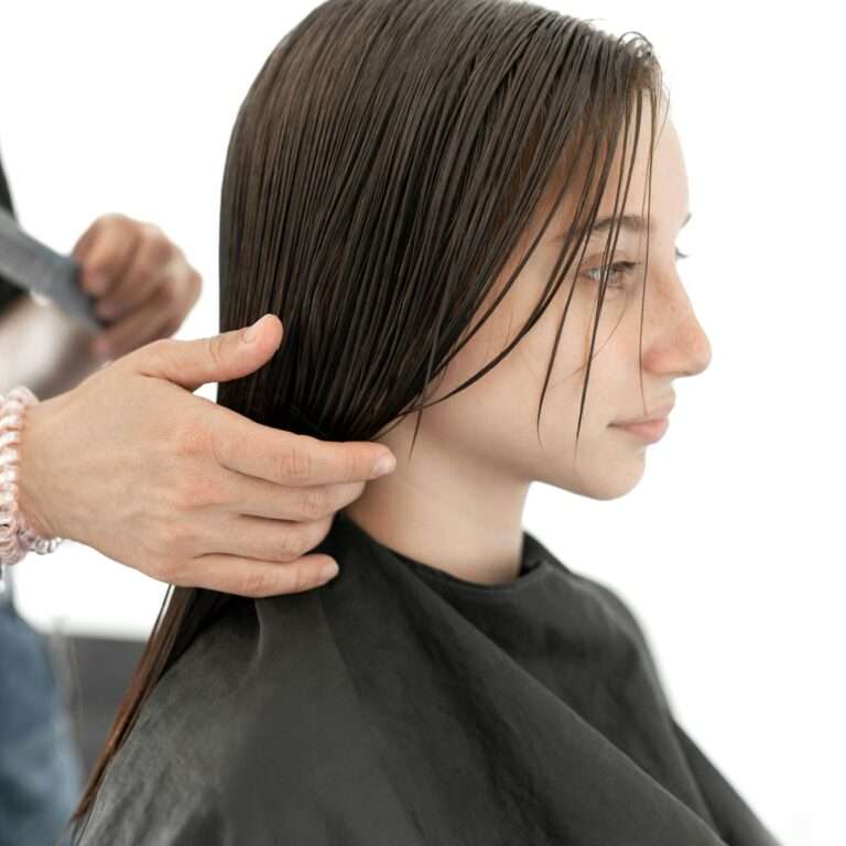 Preteen girl during haircut